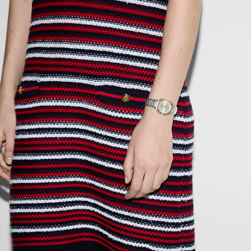 G-Flat 24mm stainless steel case with 18kt yellow gold-plated bezel and screws, Silver galvanized dial with roman indexes at 12 and 6 o’clock and diamond indexes, Stainless steel bracelet YA166503