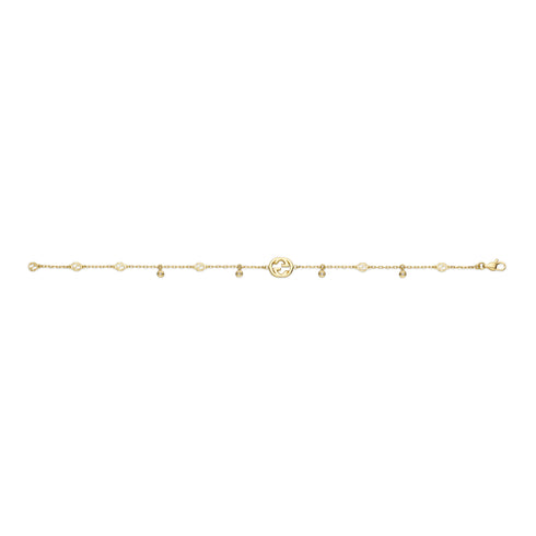 Interlocking G Bracelet in 18kt yellow gold and diamonds YBA729403002