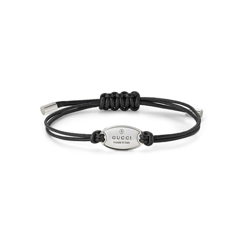 Trademark Bracelet in sterling silver and black leather strap with oval tag YBA797194001